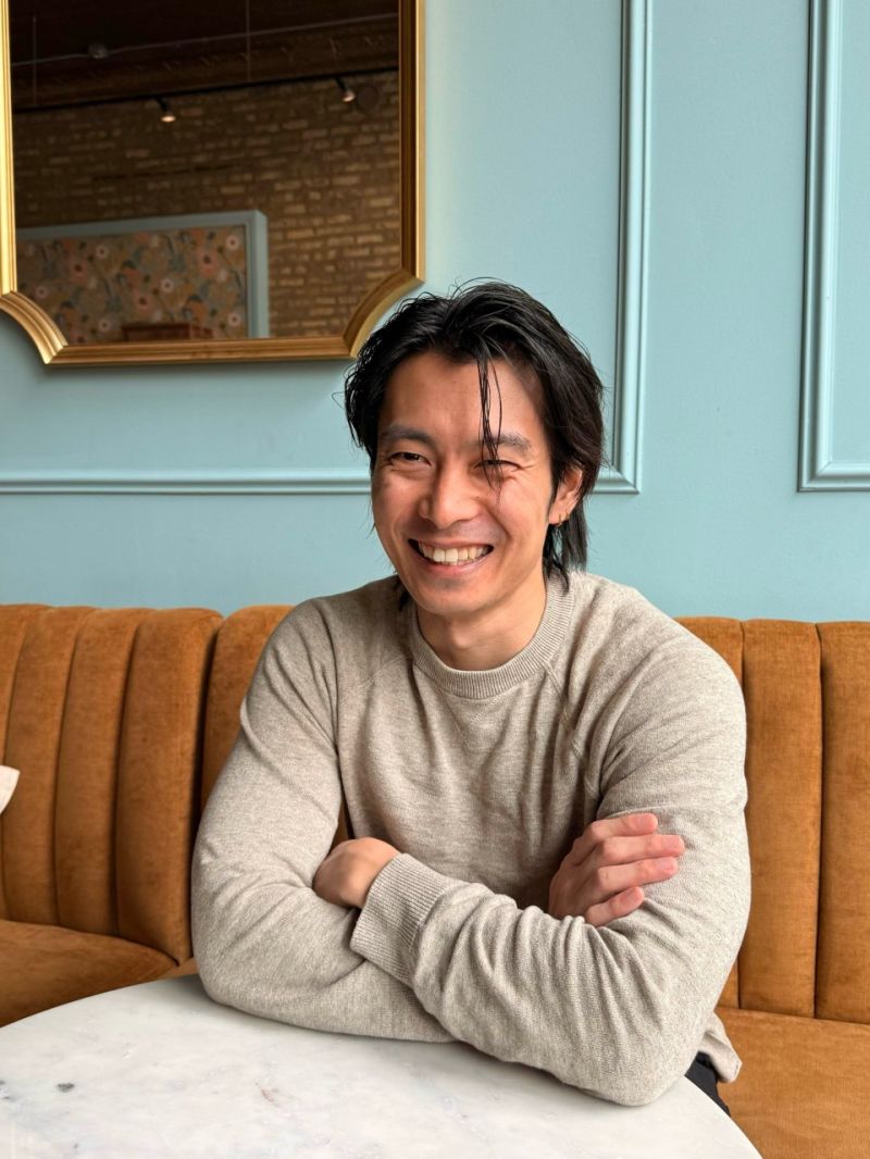 Wataru Inoue seated at a banquette